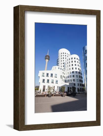 Neuer Zollhof Buildings Designed by Frank Gehry with Rheinturm Tower, Media Harbour-null-Framed Photographic Print