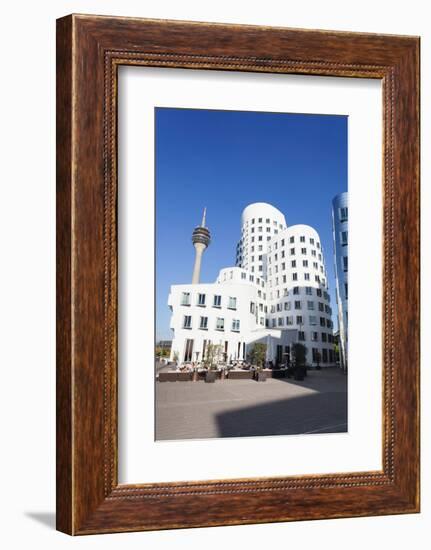 Neuer Zollhof Buildings Designed by Frank Gehry with Rheinturm Tower, Media Harbour-null-Framed Photographic Print