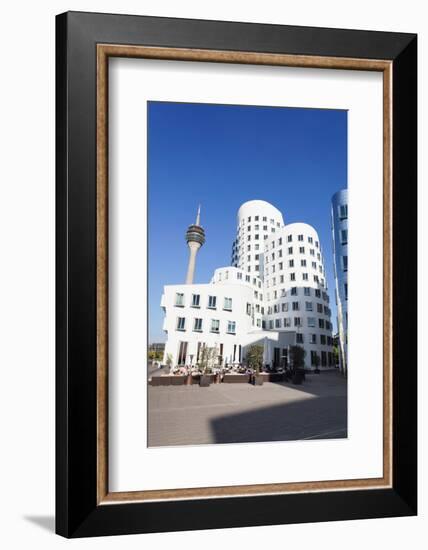 Neuer Zollhof Buildings Designed by Frank Gehry with Rheinturm Tower, Media Harbour-null-Framed Photographic Print