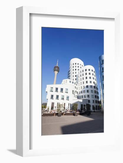 Neuer Zollhof Buildings Designed by Frank Gehry with Rheinturm Tower, Media Harbour-null-Framed Photographic Print