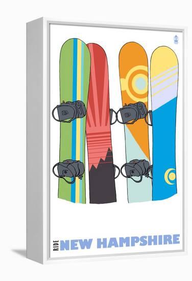 New Hampshire, Snowboards in the Snow-Lantern Press-Framed Stretched Canvas