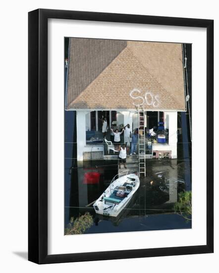 New Orleans Residents Wait to Be Rescued from the Floodwaters of Hurricane Katrina-null-Framed Photographic Print