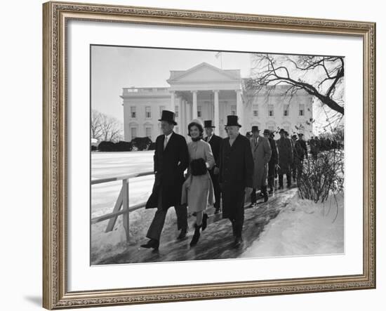 New Pres. John F. Kennedy and Wife Jacqueline Kennedy and Others Walking to His Inauguration-null-Framed Photographic Print