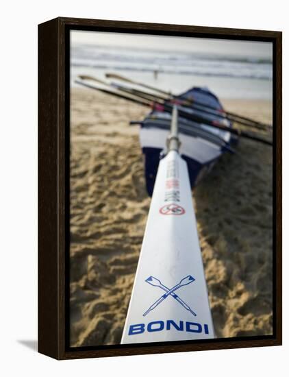 New South Wales, Sydney, A Surfboat Sits on Beach at Bondi in Sydney's Eastern Beaches, Australia-Andrew Watson-Framed Premier Image Canvas