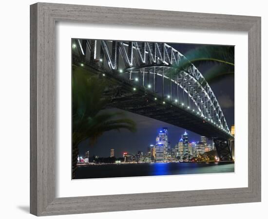 New South Wales, Sydney, Palm Trees Frame the Sydney Harbour Bridge and Skyline of Central Sydney, -Andrew Watson-Framed Photographic Print