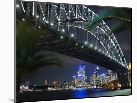 New South Wales, Sydney, Palm Trees Frame the Sydney Harbour Bridge and Skyline of Central Sydney, -Andrew Watson-Mounted Photographic Print