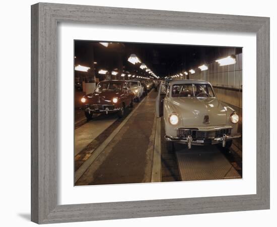 New Studebakers Coming Off the Assembly Line in South Bend, Indiana. 1946-Bernard Hoffman-Framed Photographic Print