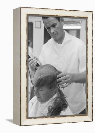 New U.S. Army draft recruit getting his hair cut by a barber, May 15 1967-Warren K. Leffler-Framed Premier Image Canvas