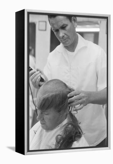 New U.S. Army draft recruit getting his hair cut by a barber, May 15 1967-Warren K. Leffler-Framed Premier Image Canvas