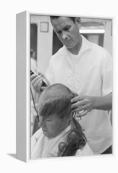 New U.S. Army draft recruit getting his hair cut by a barber, May 15 1967-Warren K. Leffler-Framed Premier Image Canvas