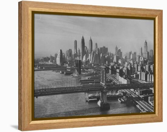 New York City Behind the Brooklyn and Manhattan Bridges That are Hovering over the East River-Dmitri Kessel-Framed Premier Image Canvas