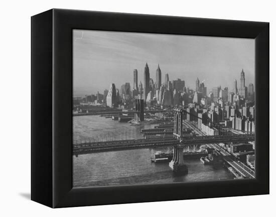 New York City Behind the Brooklyn and Manhattan Bridges That are Hovering over the East River-Dmitri Kessel-Framed Premier Image Canvas