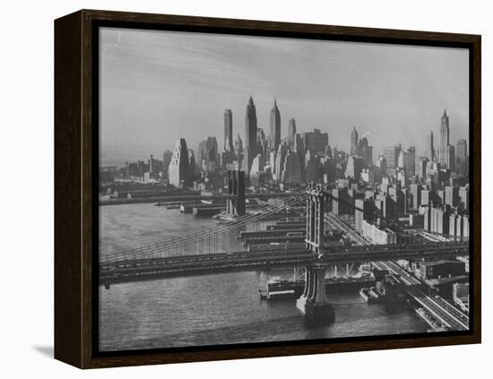 New York City Behind the Brooklyn and Manhattan Bridges That are Hovering over the East River-Dmitri Kessel-Framed Premier Image Canvas