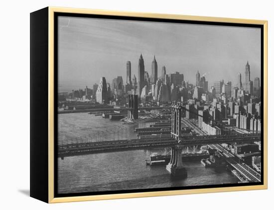 New York City Behind the Brooklyn and Manhattan Bridges That are Hovering over the East River-Dmitri Kessel-Framed Premier Image Canvas