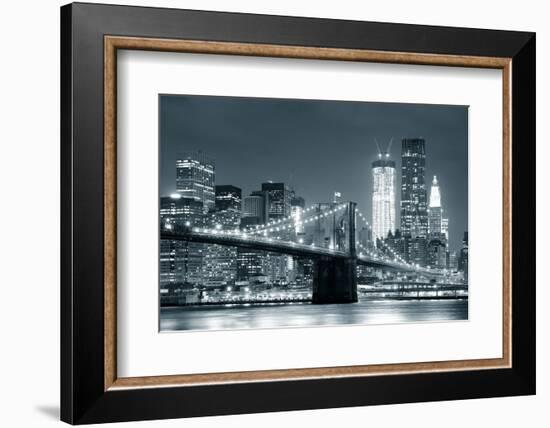 New York City Brooklyn Bridge Black and White with Downtown Skyline over East River.-Songquan Deng-Framed Photographic Print