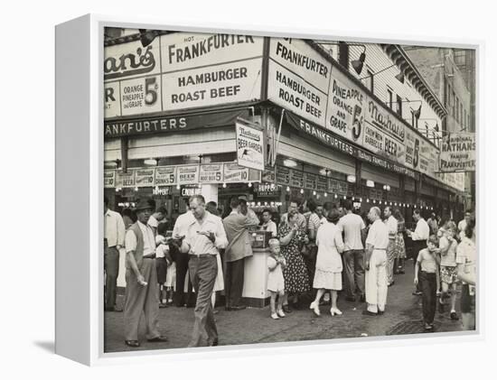 New York City Street Corner with Customers Ordering and Eating Nathan's Hot Dogs-null-Framed Stretched Canvas