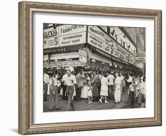 New York City Street Corner with Customers Ordering and Eating Nathan's Hot Dogs-null-Framed Photo