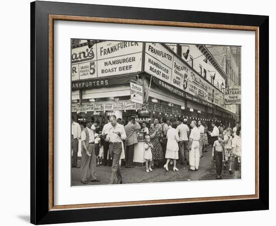 New York City Street Corner with Customers Ordering and Eating Nathan's Hot Dogs-null-Framed Photo