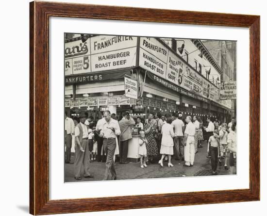 New York City Street Corner with Customers Ordering and Eating Nathan's Hot Dogs-null-Framed Photo