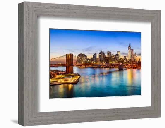 New York City, USA Skyline over East River and Brooklyn Bridge.-Sean Pavone-Framed Photographic Print