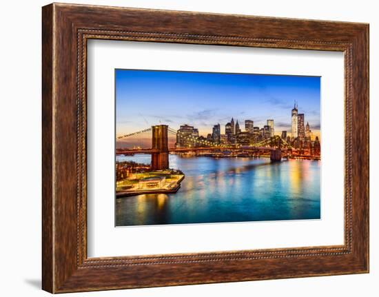 New York City, USA Skyline over East River and Brooklyn Bridge.-Sean Pavone-Framed Photographic Print