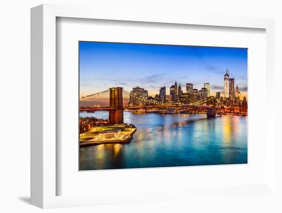 New York City, USA Skyline over East River and Brooklyn Bridge.-Sean Pavone-Framed Photographic Print