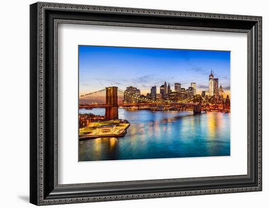New York City, USA Skyline over East River and Brooklyn Bridge.-Sean Pavone-Framed Photographic Print