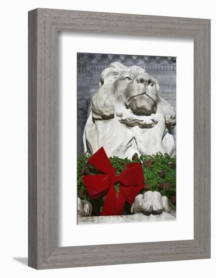 New York Public Library Lion Decorated with a Christmas Wreath during the Holidays.-Jon Hicks-Framed Premium Photographic Print