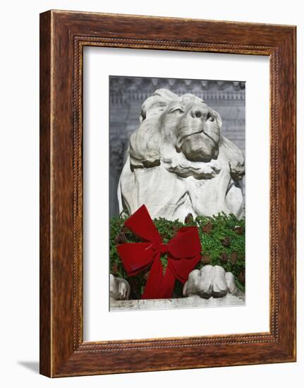 New York Public Library Lion Decorated with a Christmas Wreath during the Holidays.-Jon Hicks-Framed Premium Photographic Print