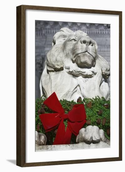 New York Public Library Lion Decorated with a Christmas Wreath during the Holidays.-Jon Hicks-Framed Photographic Print