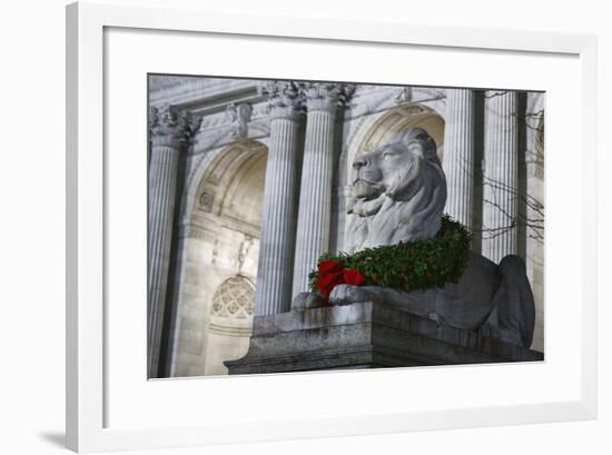 New York Public Library Lion Decorated with a Christmas Wreath during the Holidays.-Jon Hicks-Framed Photographic Print