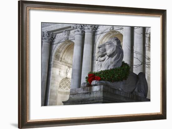 New York Public Library Lion Decorated with a Christmas Wreath during the Holidays.-Jon Hicks-Framed Photographic Print