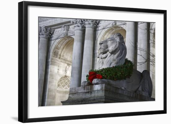 New York Public Library Lion Decorated with a Christmas Wreath during the Holidays.-Jon Hicks-Framed Photographic Print