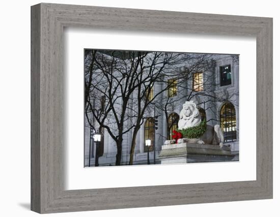 New York Public Library Lion Decorated with a Christmas Wreath during the Holidays.-Jon Hicks-Framed Photographic Print