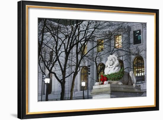 New York Public Library Lion Decorated with a Christmas Wreath during the Holidays.-Jon Hicks-Framed Photographic Print