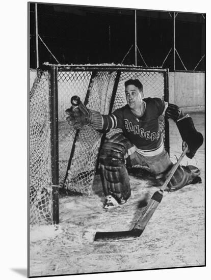 New York Rangers Goal Tender Dave Kerr Stopping the Puck-Gjon Mili-Mounted Premium Photographic Print