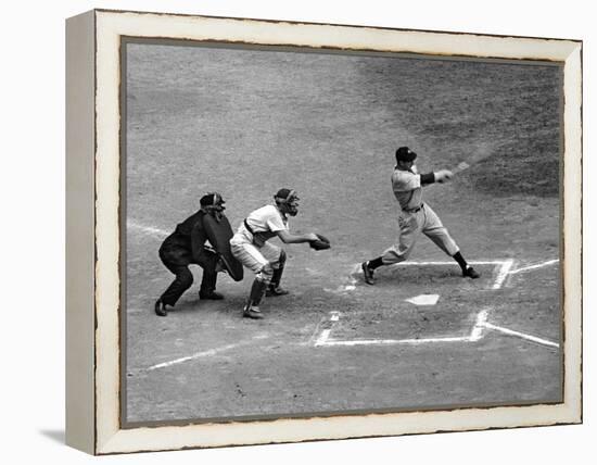 New York Yankee Joe Di Maggio Swinging Bat in Game Against the Philadelphia Athletics-Alfred Eisenstaedt-Framed Premier Image Canvas