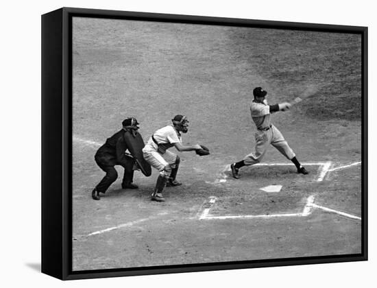 New York Yankee Joe Di Maggio Swinging Bat in Game Against the Philadelphia Athletics-Alfred Eisenstaedt-Framed Premier Image Canvas