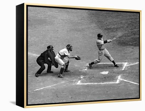 New York Yankee Joe Di Maggio Swinging Bat in Game Against the Philadelphia Athletics-Alfred Eisenstaedt-Framed Premier Image Canvas