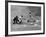 New York Yankee Joe Di Maggio Swinging Bat in Game Against the Philadelphia Athletics-Alfred Eisenstaedt-Framed Premium Photographic Print