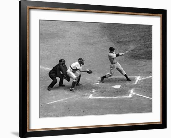 New York Yankee Joe Di Maggio Swinging Bat in Game Against the Philadelphia Athletics-Alfred Eisenstaedt-Framed Premium Photographic Print