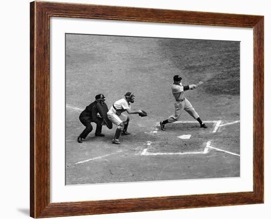 New York Yankee Joe Di Maggio Swinging Bat in Game Against the Philadelphia Athletics-Alfred Eisenstaedt-Framed Premium Photographic Print