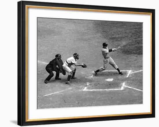 New York Yankee Joe Di Maggio Swinging Bat in Game Against the Philadelphia Athletics-Alfred Eisenstaedt-Framed Premium Photographic Print