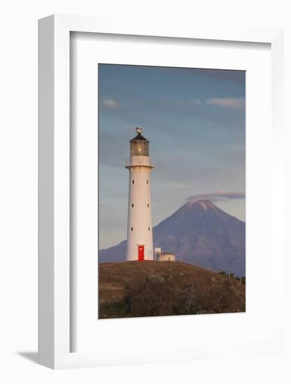 New Zealand, North Island, Pungarehu. Cape Egmont Lighthouse and Mt. Taranaki-Walter Bibikow-Framed Photographic Print