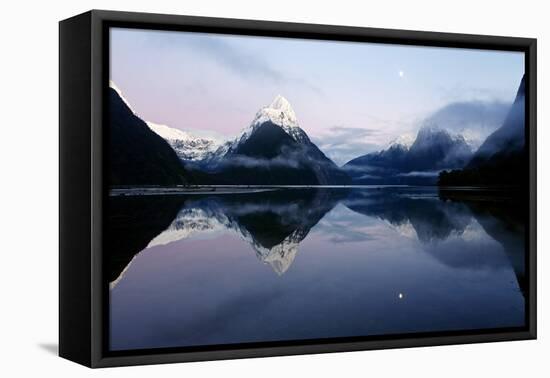 New Zealand, Nuova Zelanda, Fiordland, Milford Sound and Moon During a Cold and Misty Sunrise.-Andrea Pozzi-Framed Premier Image Canvas