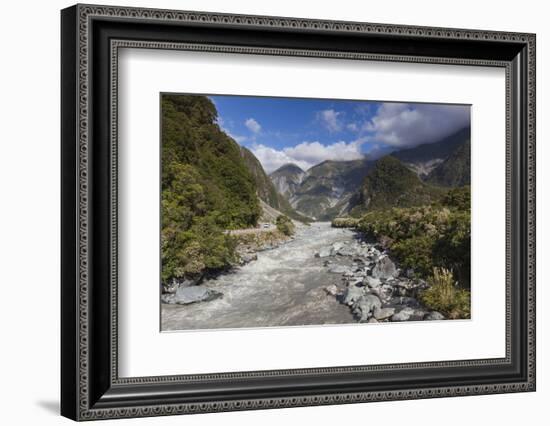 New Zealand, South Island, Fox Glacier Village, Fox Glacier hikers along Fox River-Walter Bibikow-Framed Photographic Print