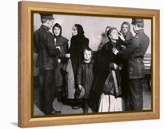 Newly Arrived Immigrants Undergoing Medical Examination on Ellis Island, New York, c.1910-null-Framed Premier Image Canvas