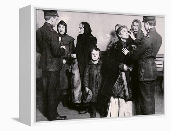 Newly Arrived Immigrants Undergoing Medical Examination on Ellis Island, New York, c.1910-null-Framed Premier Image Canvas