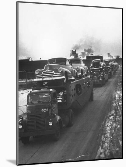 Newly-Made Pontiacs Being Transported on Trucks-Ralph Morse-Mounted Photographic Print