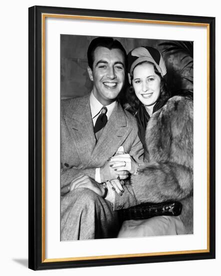 Newlyweds Robert Taylor and Barbara Stanwyck After Their Surprise Elopement, ca. 1939-null-Framed Photo